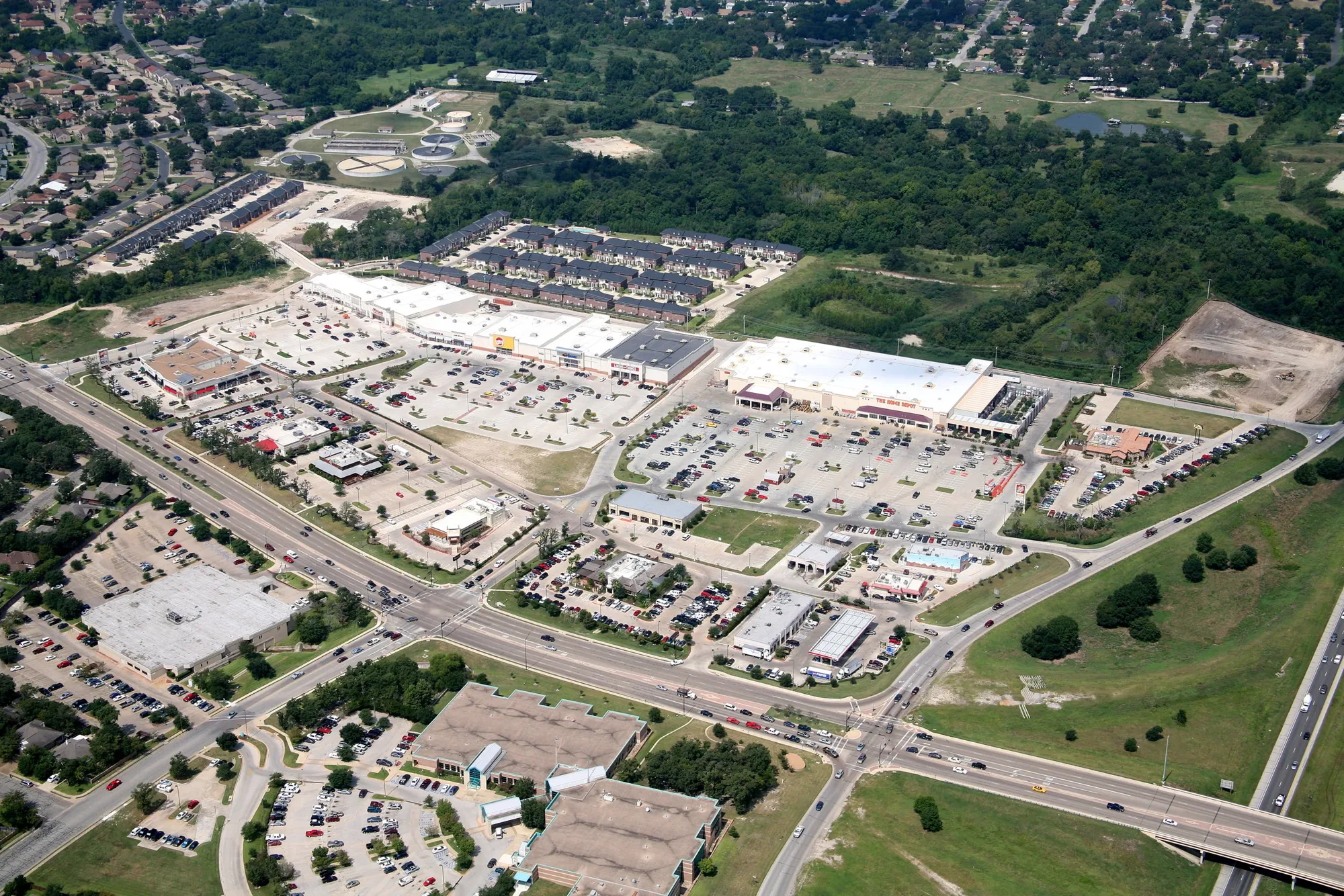 Retail and Restaurant Chains work on a commercial roof in College Station, TX