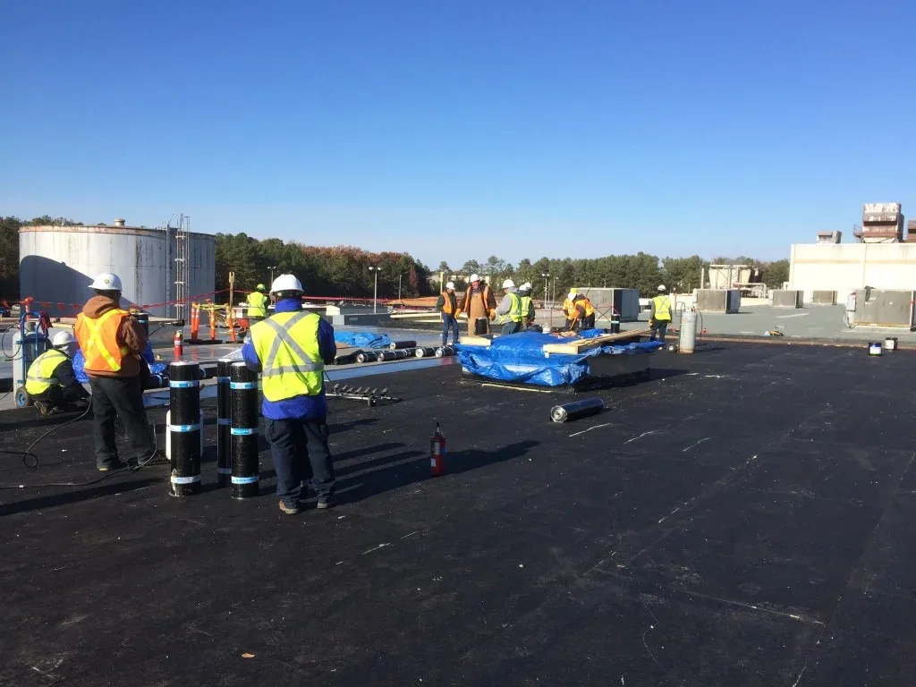 Occupied Building Reroofing in College Station, TX